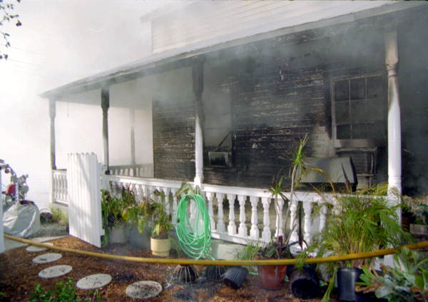 View of fire damage to the east side of the house at 1709 Flagler Ave..