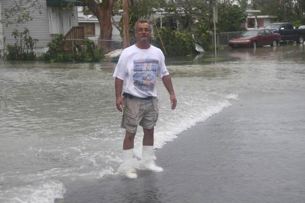 Blain McDonald on Flagler Ave. as storm surge flows across..
