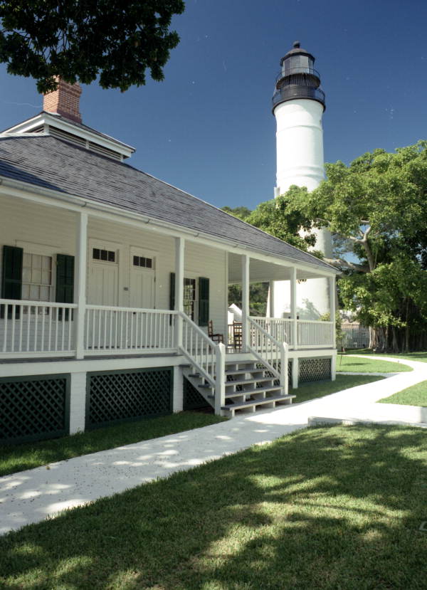 Key West Lighthouse with the lighthouse keepers quarters in the foreground..