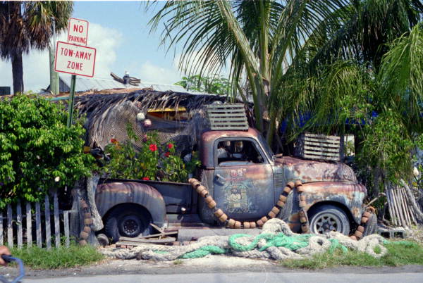 Old truck advertising B.O.'s Fish Wagon restaurant at 801 Caroline Street - Key West, Florida.