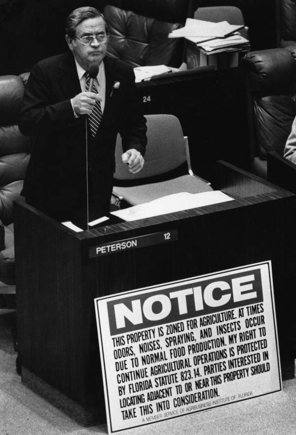 Senator Curtis Peterson debates his farm relief bill - Tallahassee, Florida.