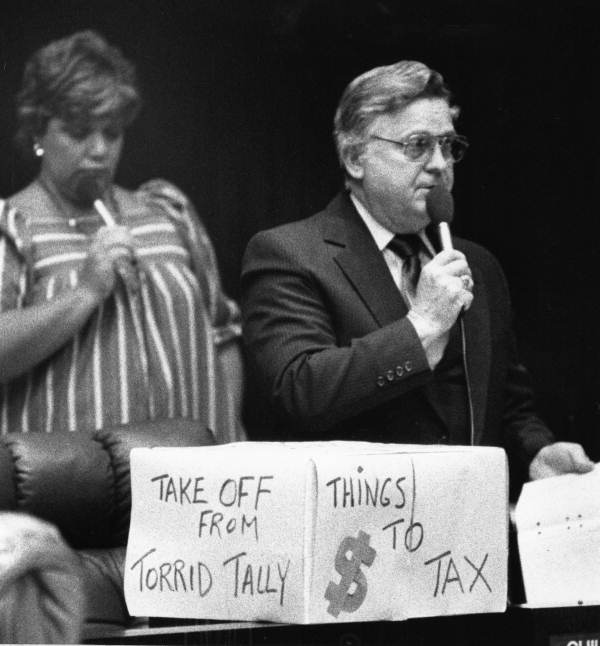 Senator Don Childers, D-West Palm Beach, (r), debates a bill while Senator Roberta Fox, D-Miami awaits her turn - Tallahassee, Florida.