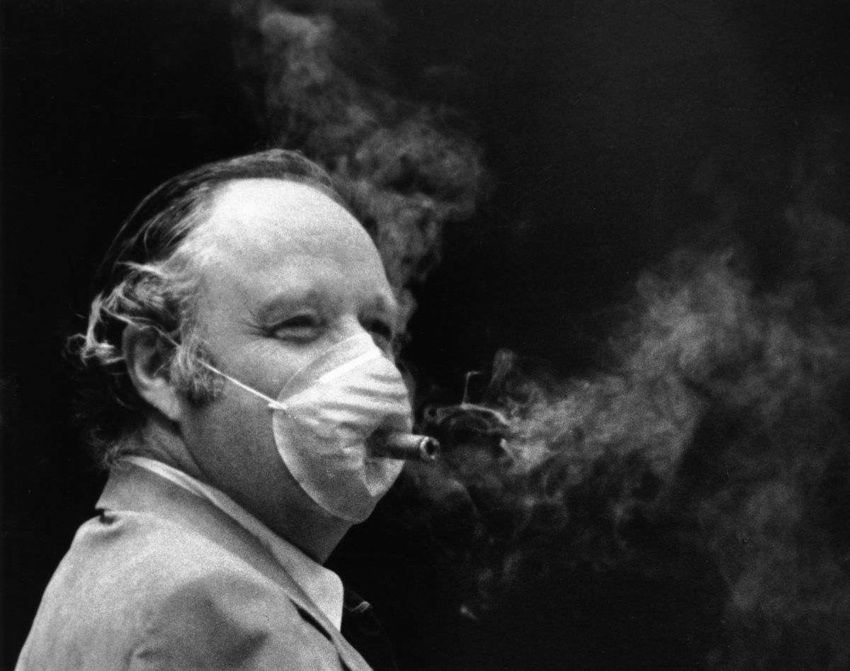 which senators smoke cigarettes Florida Memory • Senator Warren Henderson smokes through a surgical mask