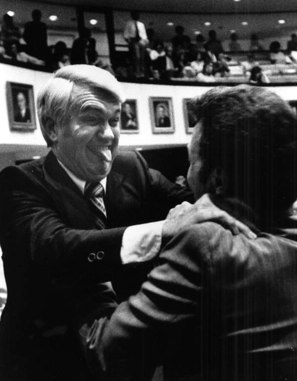 Senator John Hill jokingly grabbing Senator Tom Danson on the final day of the 1979 session in Tallahassee, Florida.