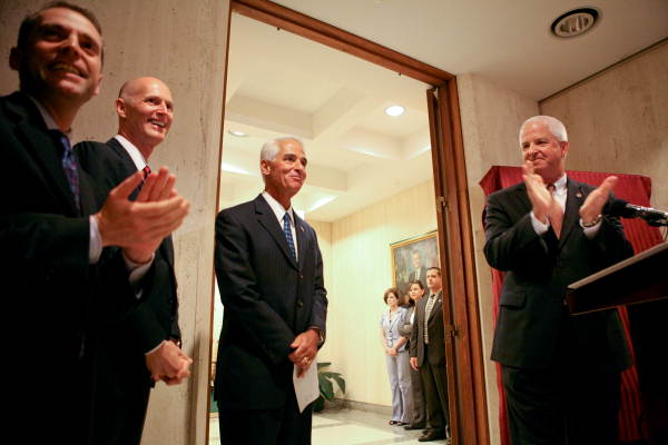 Former governor Charlie Crist being applauded during unveiling ceremony of his official portrait in Tallahassee, Florida.