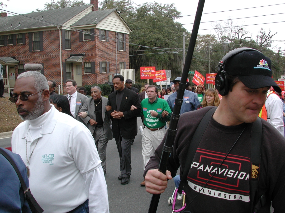 Jesse Jackson walking in demonstration for Gore during the 2000 presidential election vote dispute.