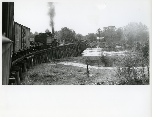 Live Oak, Perry & Gulf Railroad train crossing the Suwannee River at Dowling Park, Florida.