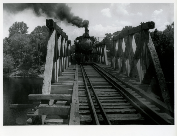 Live Oak, Perry & Gulf Railroad train crossing the Suwannee River at Dowling Park, Florida.