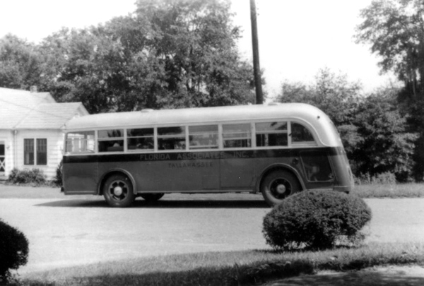 Florida Associates, Inc. bus at the Los Robles subdivision in Tallahassee, Florida.