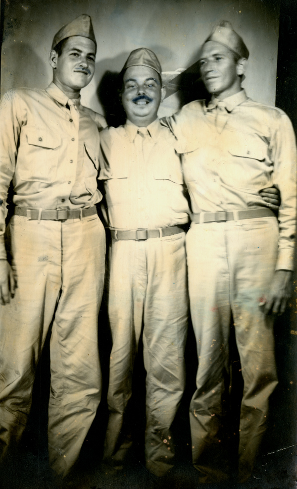 Airmen posing together at Edwards Air Force Base in California.