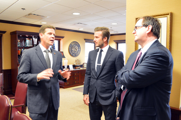 State Senator Andy Gardiner, left, speaking with David Beckham and Mark Abbott about professional soccer in Florida.