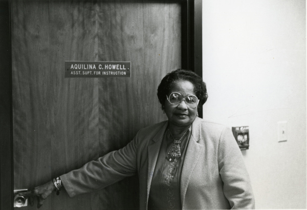 Portrait of Leon County Assistant Superintendent for Instruction Aquilina Casanas Howell at her office door.