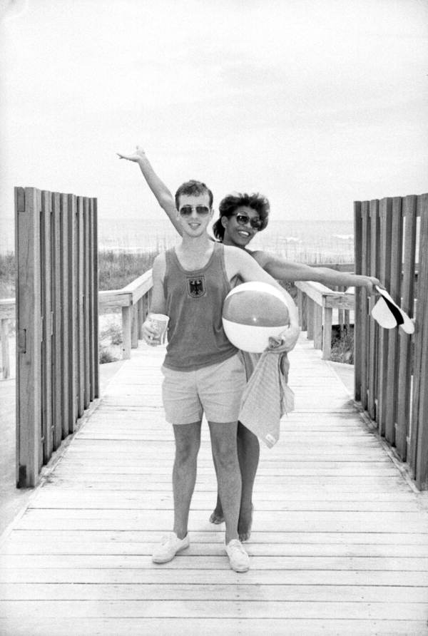 Fashion models in summerwear at the beach.