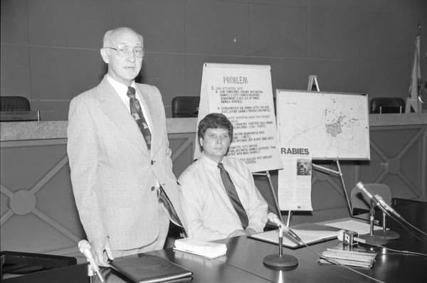 Men lecture on Rabies quarantine - Tallahassee, Florida.