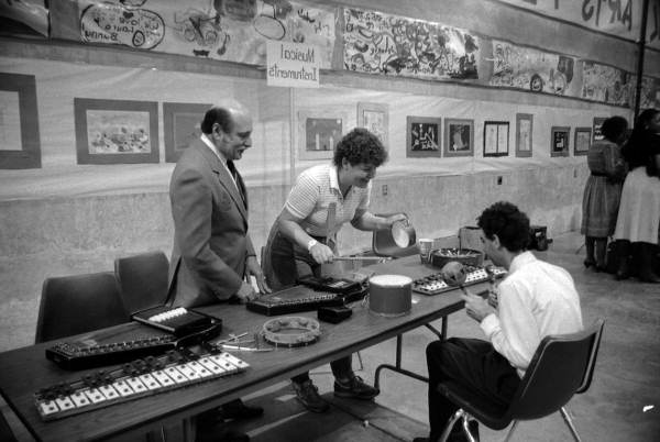 Teachers with musical instruments at the fair - Tallahassee, Florida.
