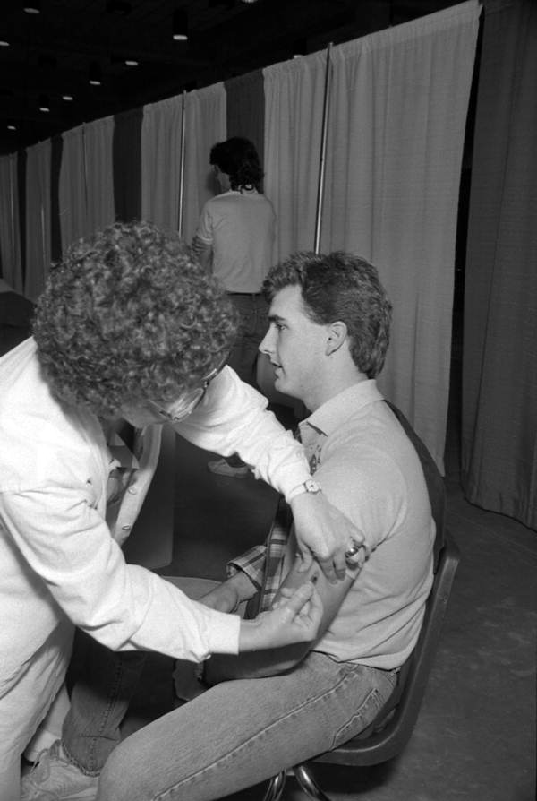 Student receives a measles shot - Tallahassee, Florida.