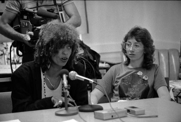 Political activist Angela Davis and unidentified woman at a press conference during the Take Back the Night event - Tallahassee, Florida.