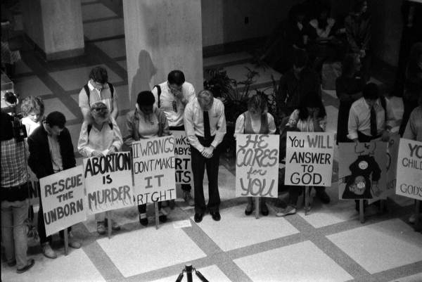 Pro-life supporters pray in the Capitol rotunda - Tallahassee, Florida.