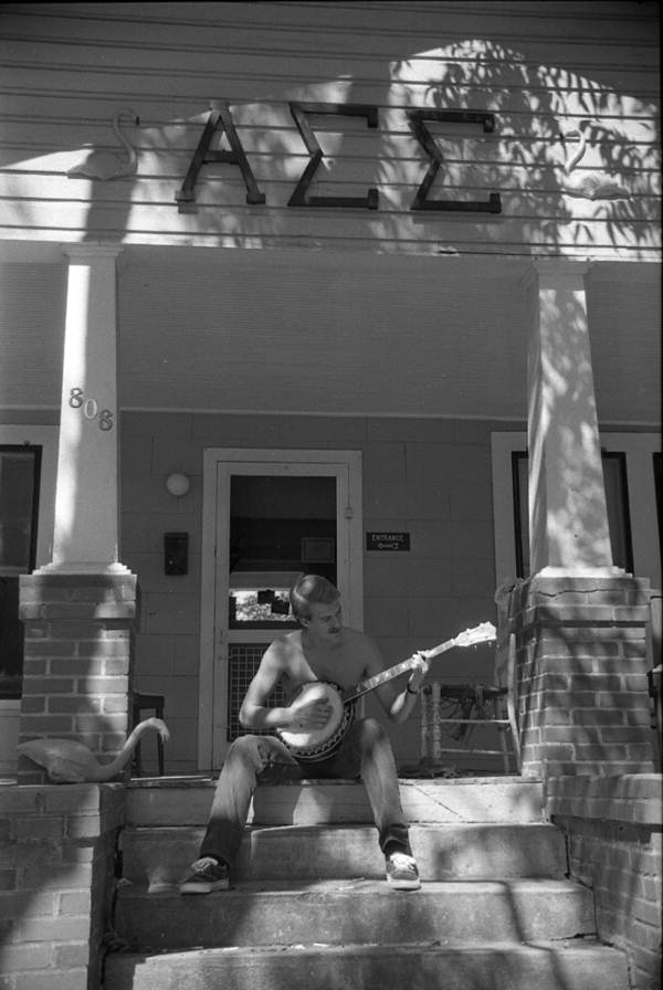 FSU student Bornstein playing a banjo at a fraternity house - Tallahassee, Florida.