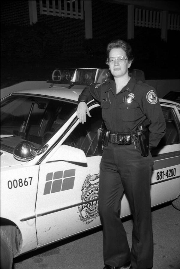 Jennifer Smith policewoman with her police car - Tallahassee, Florida.