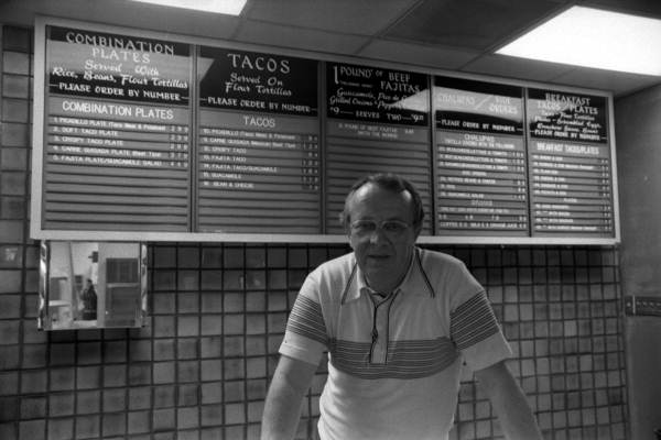Menu and man at a restaurant, Mamacitas Blessings - Tallahassee, Florida.