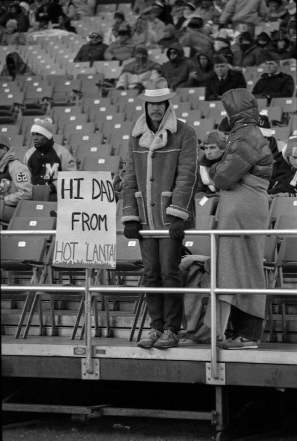 Spectator with a sign - Tallahassee, Florida.