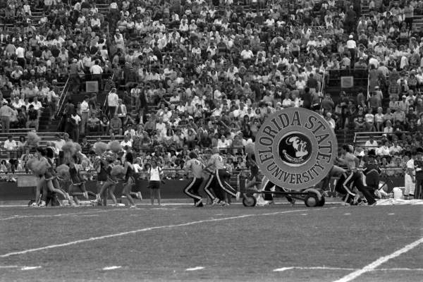 FSU's cheerleaders run out onto the field - Tallahassee, Florida .