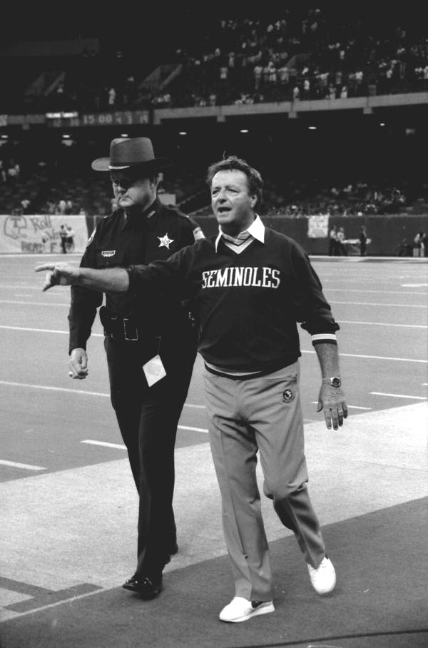 Coach Bobby Bowden and a police officer - Tallahassee, Florida.