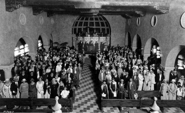 Interior view with members of the Coral Gables Congregational Church.