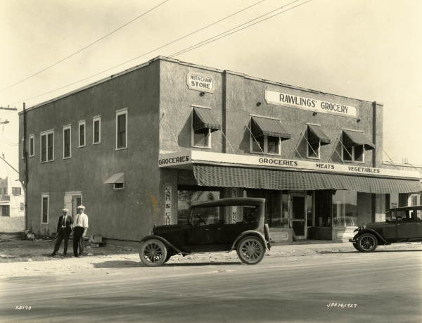 Cars parked in front of Rawlings' Grocery - Hialeah, Florida.