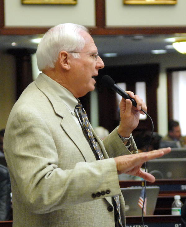 Representative Ralph Poppell, R-Titusville, promoting a measure considered on the House floor in Tallahassee, Florida.
