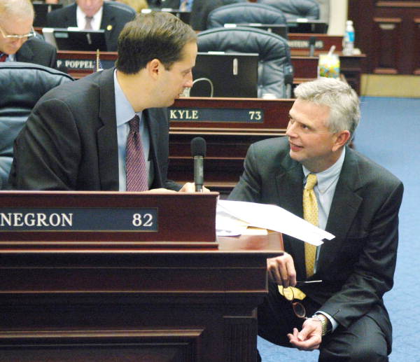 Rep. Mark Mahon, R-Jacksonville, right, and Fiscal Council Chairman Joe Negron, R-Stuart, left, confer on the House floor during the 2006 Legislature..