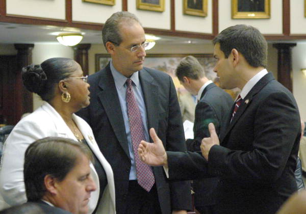 Rep. Joyce Cusack, D-DeLand, left, confers with Democratic leader Dan Gelber, D-Miami Beach and Speaker Marco Rubio, R-Miami, on the House floor during the 2007 Legislature - Tallahassee, Florida .