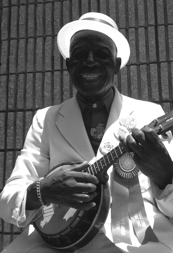 "Washboard Bill" Cooke playing a "banjo uke" at the Florida Folk Festival - White Springs, Florida.