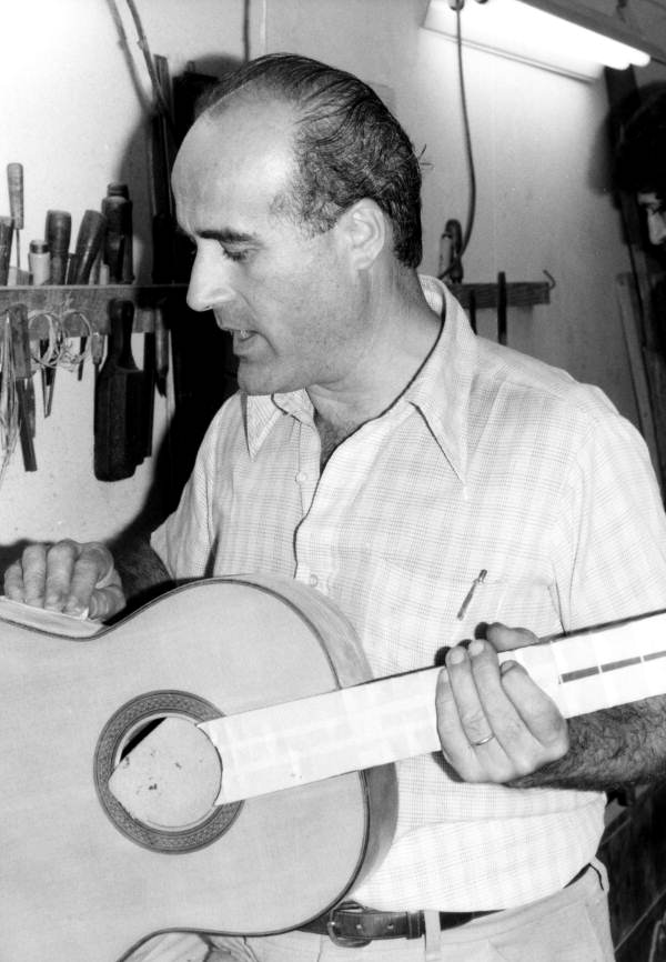 Guitar maker Paris Banchetti working on one of his guitars in Miami, Florida.