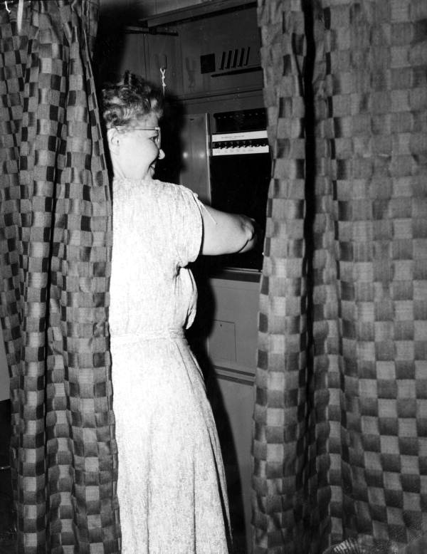 View showing storyteller Thelma Boltin in a voting booth in Gainesville, Florida.