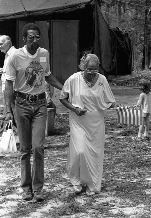Florida Folklife Program director David Closson with "Diamond Teeth" Mary McClain at the 1982 Florida Folk Festival.