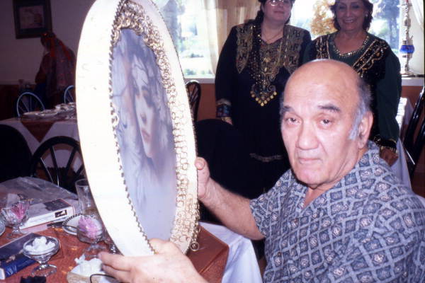 Professor Attah Kassari with a Daf percussion instrument in Clearwater, Florida.