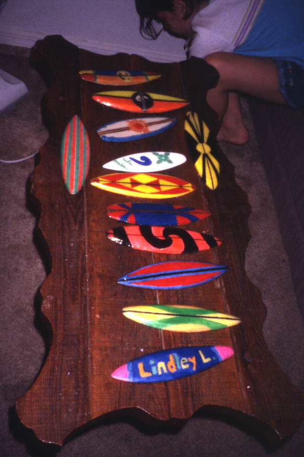 Table decorated with miniature surfboards in Kissimmee, Florida.