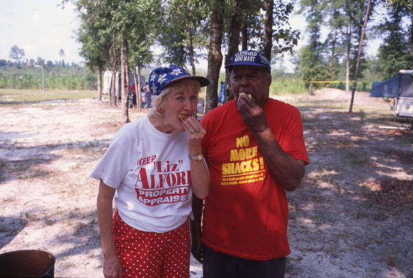 Visitors sampling jelly made during a demonstration at the Renaissance Park Cultural Festival in Marianna, Florida.