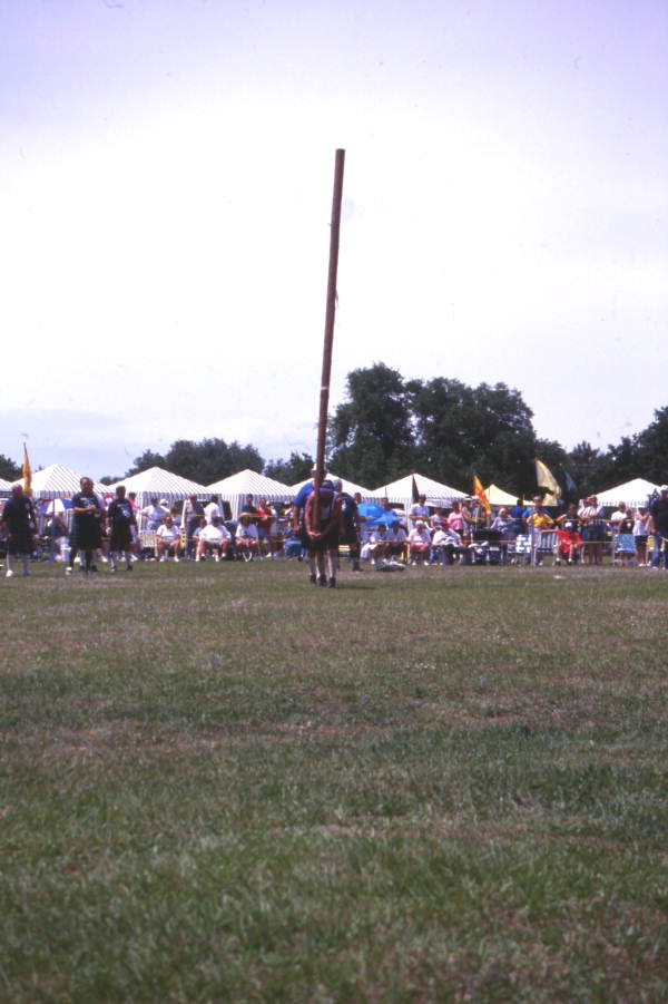 Competitor preparing to "turn the caber" during the Highland Games in Dunedin, Florida.