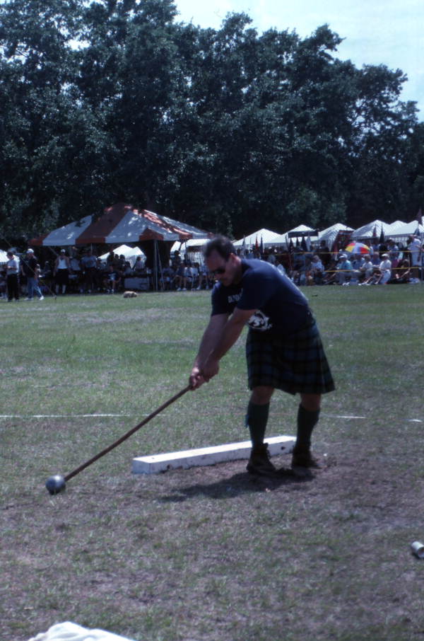 Participant preparing to throw the hammer during the Highland Games in Dunedin, Florida.