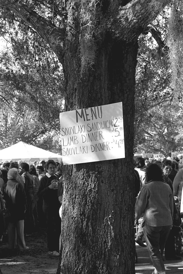 Sign showing the menu of Greek food at Epiphany Day - Tarpon Springs, Florida