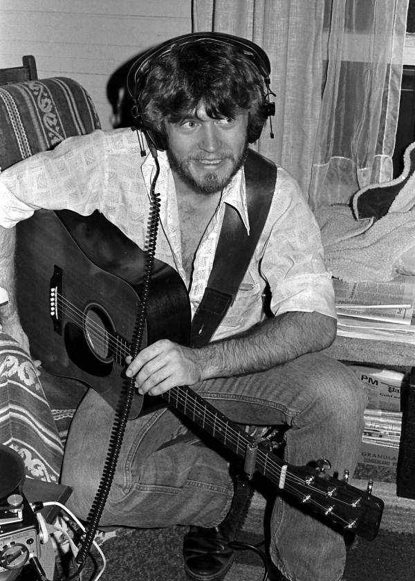 Lead guitarist Dry Trivette shown listening to tape during bluegrass session - East Palatka, Florida