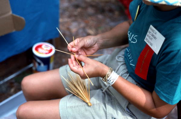 Marcia McCrory weaving some wheat at the Florida Folk Festival - White Springs, Florida