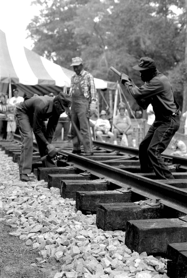 Gandy dancers performing railroad work at the Florida Folk Festival- White Springs, Florida