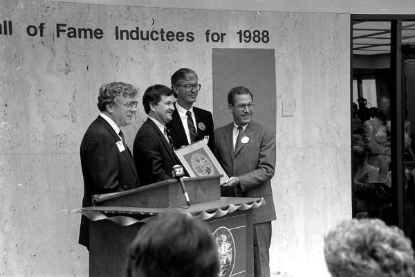 Florida Secretary of State Jim Smith (far right) presenting a Florida Artists Hall of Fame award to unidentified men - Tallahassee, Florida.