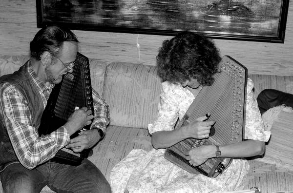 Autoharp player Charley Groth teaching apprentice Cheryl Belanger how to play the instrument- Tampa, Florida.