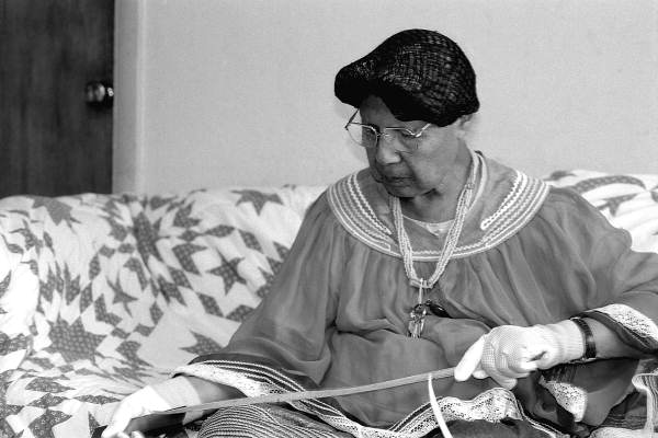 Marian Bowers making a palmetto stem basket - Brighton Seminole Indian Reservation, Florida.