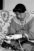 Marian Bowers making a palmetto stem basket - Brighton Seminole Indian Reservation, Florida.